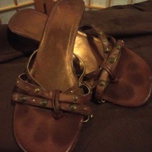 Brown strappy  sandles w\baby heal